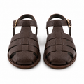 Front view of brown leather woven sandals