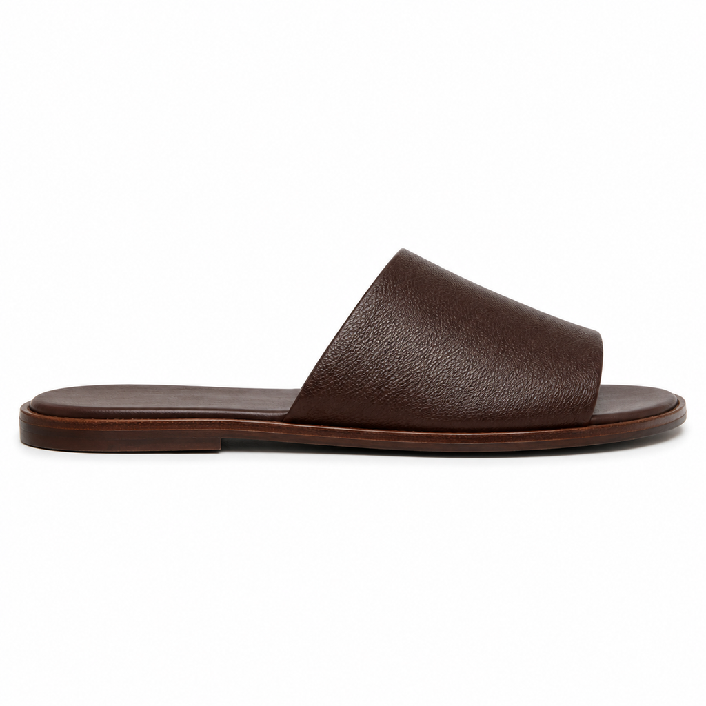 Top view of brown leather slide sandals