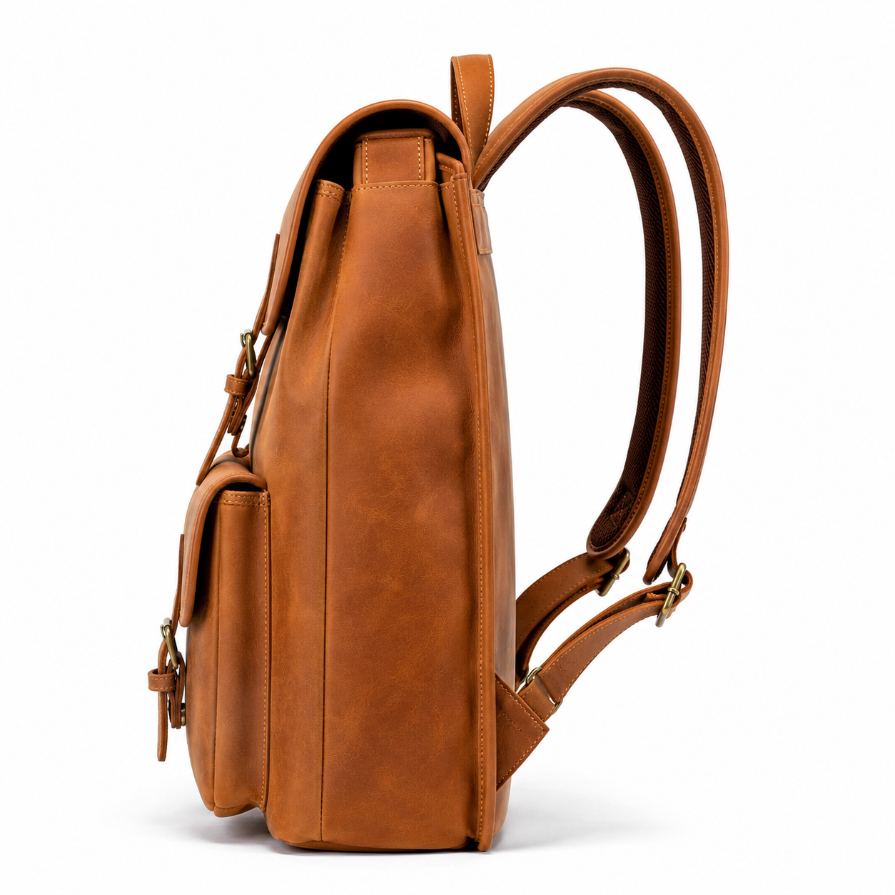 Close-up of buckle closures on the leather backpack.