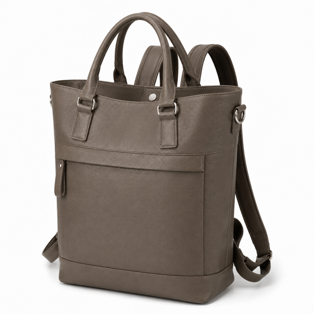 Close-up of the leather texture on the taupe tote bag.