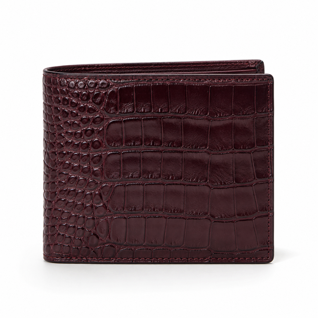 Front view of burgundy crocodile-embossed leather wallet.