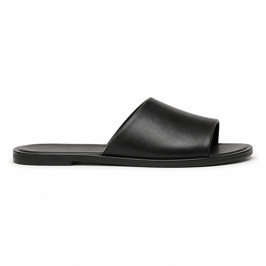 Top view of black leather slide sandals by Modish-Vogue.