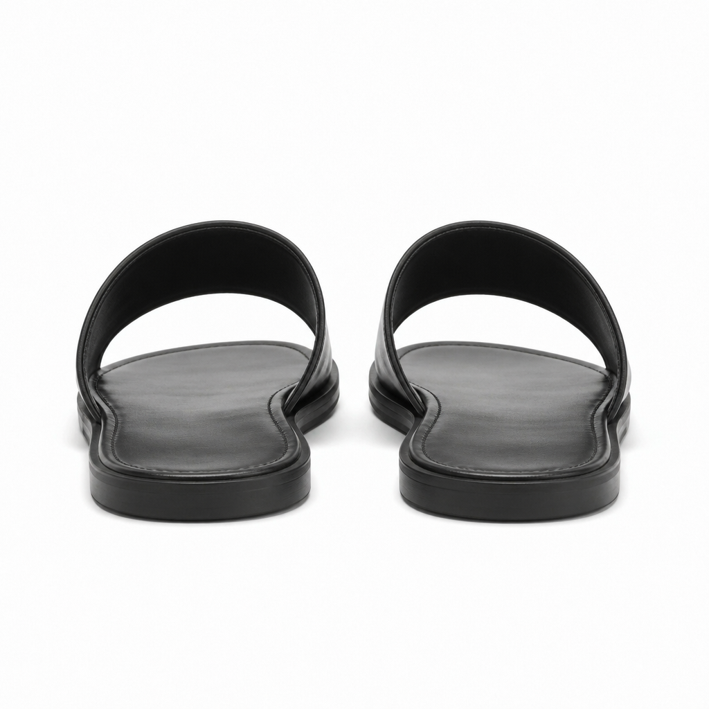 Top view of black sandals showing footbed.