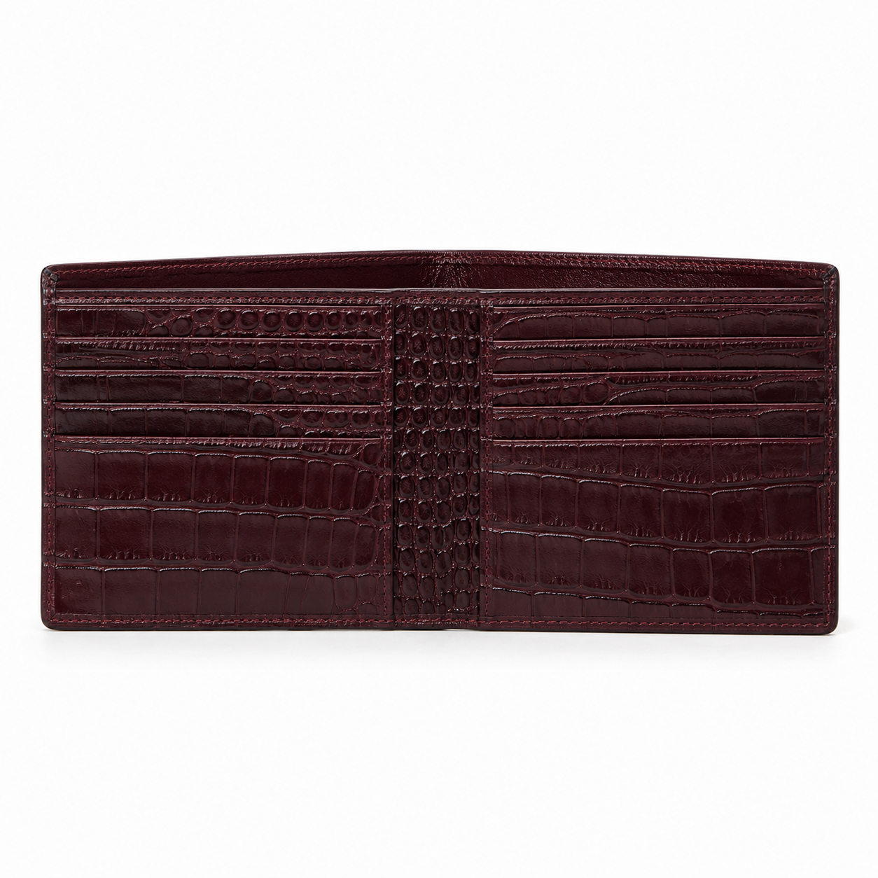 Close-up of wallet's crocodile pattern in burgundy.