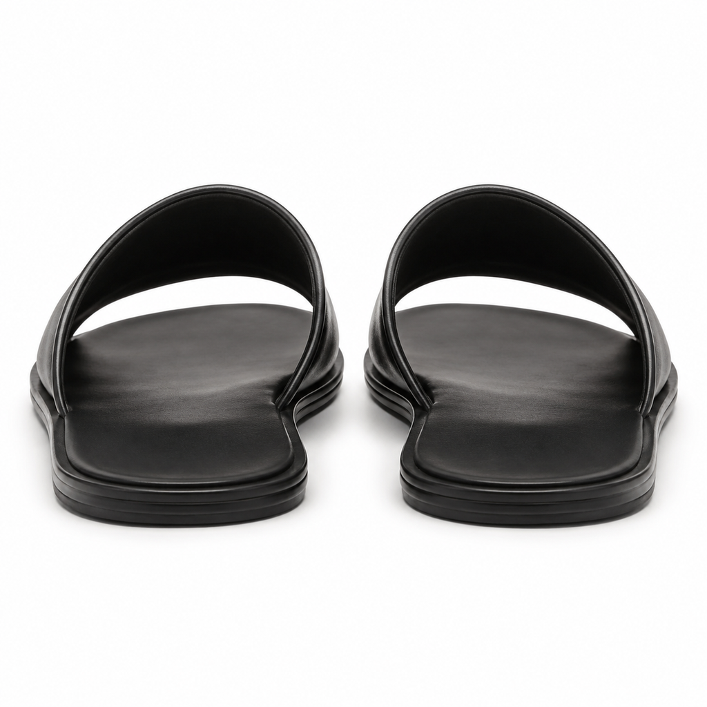Sole view of Modish-Vogue black slide sandals.
