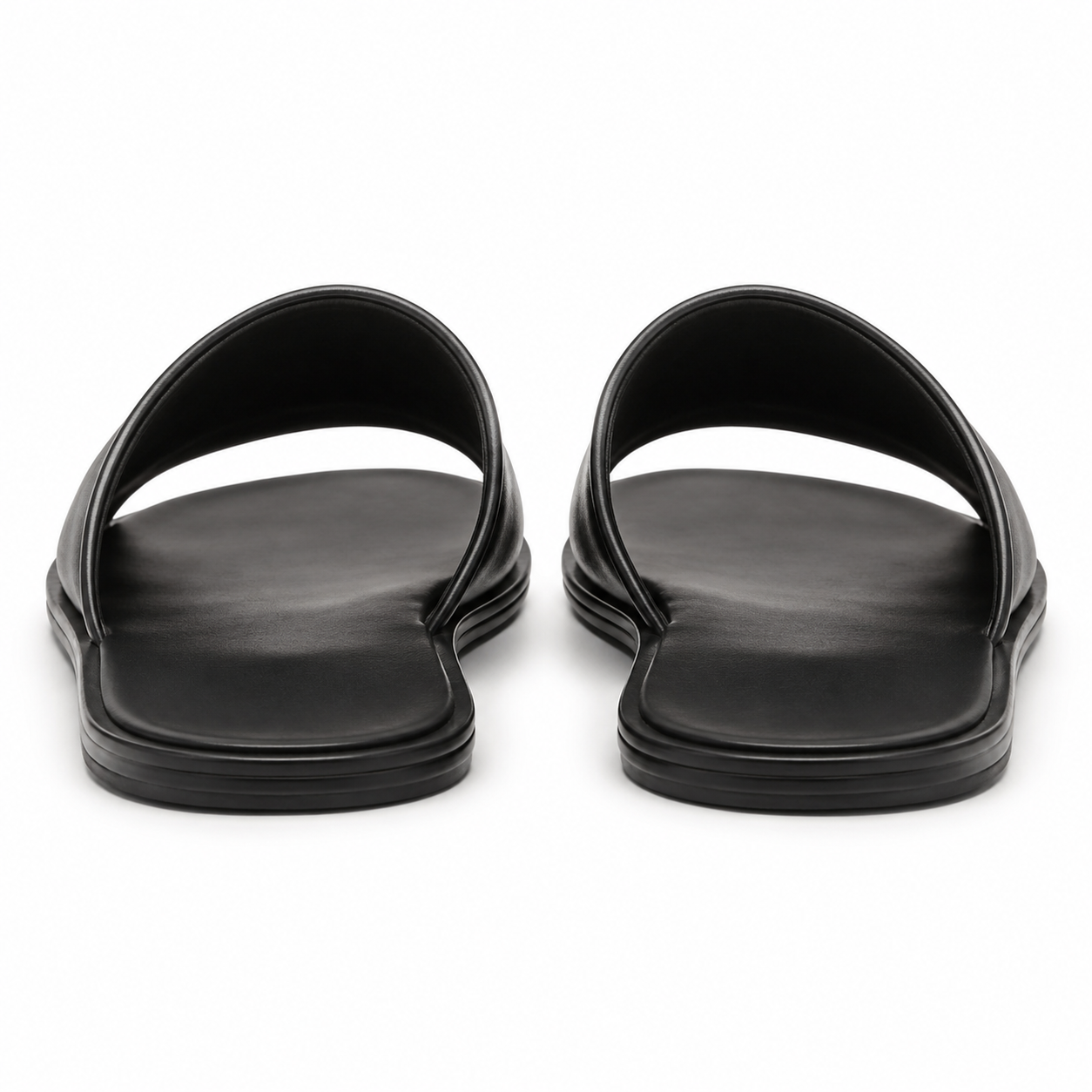 Sole view of Modish-Vogue black slide sandals.