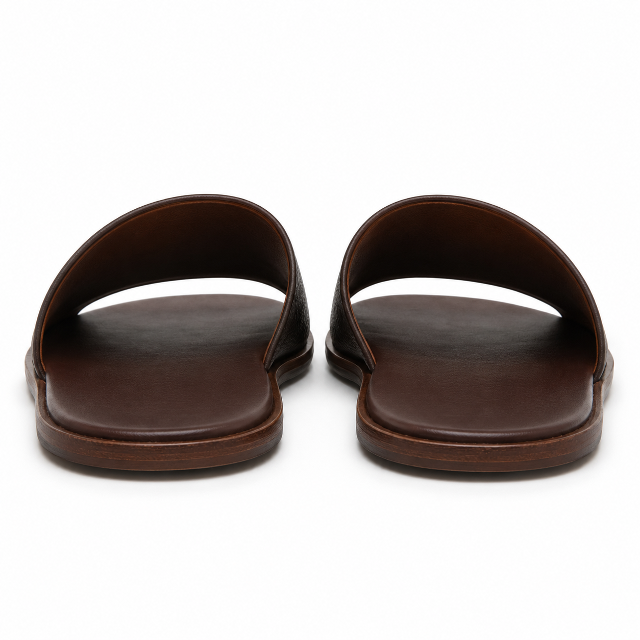 Pair of brown leather slide sandals