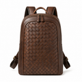 Front view of brown leather backpack with woven design