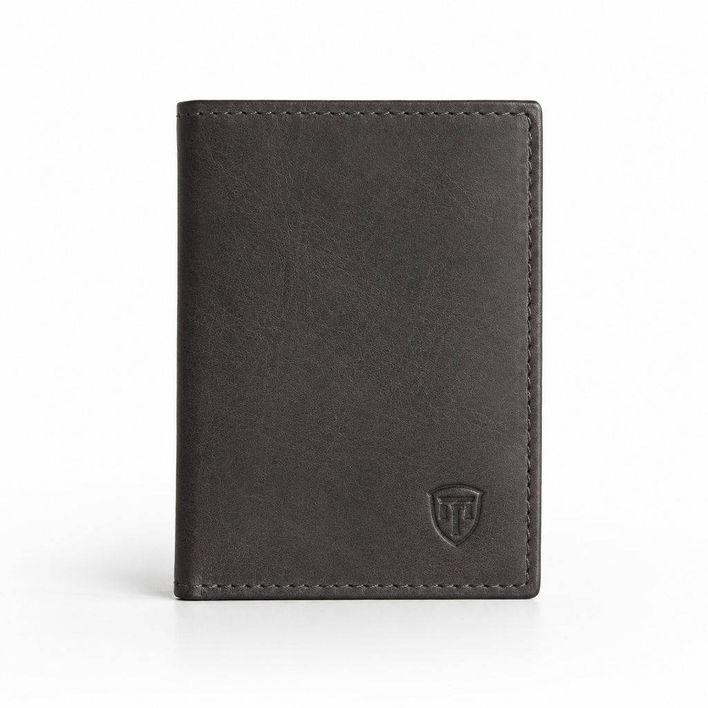 Front view of charcoal leather passport holder with embossed logo.