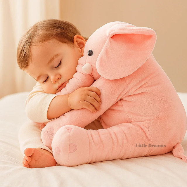 Giant elephant plush pillow in nursery with decorative setting
