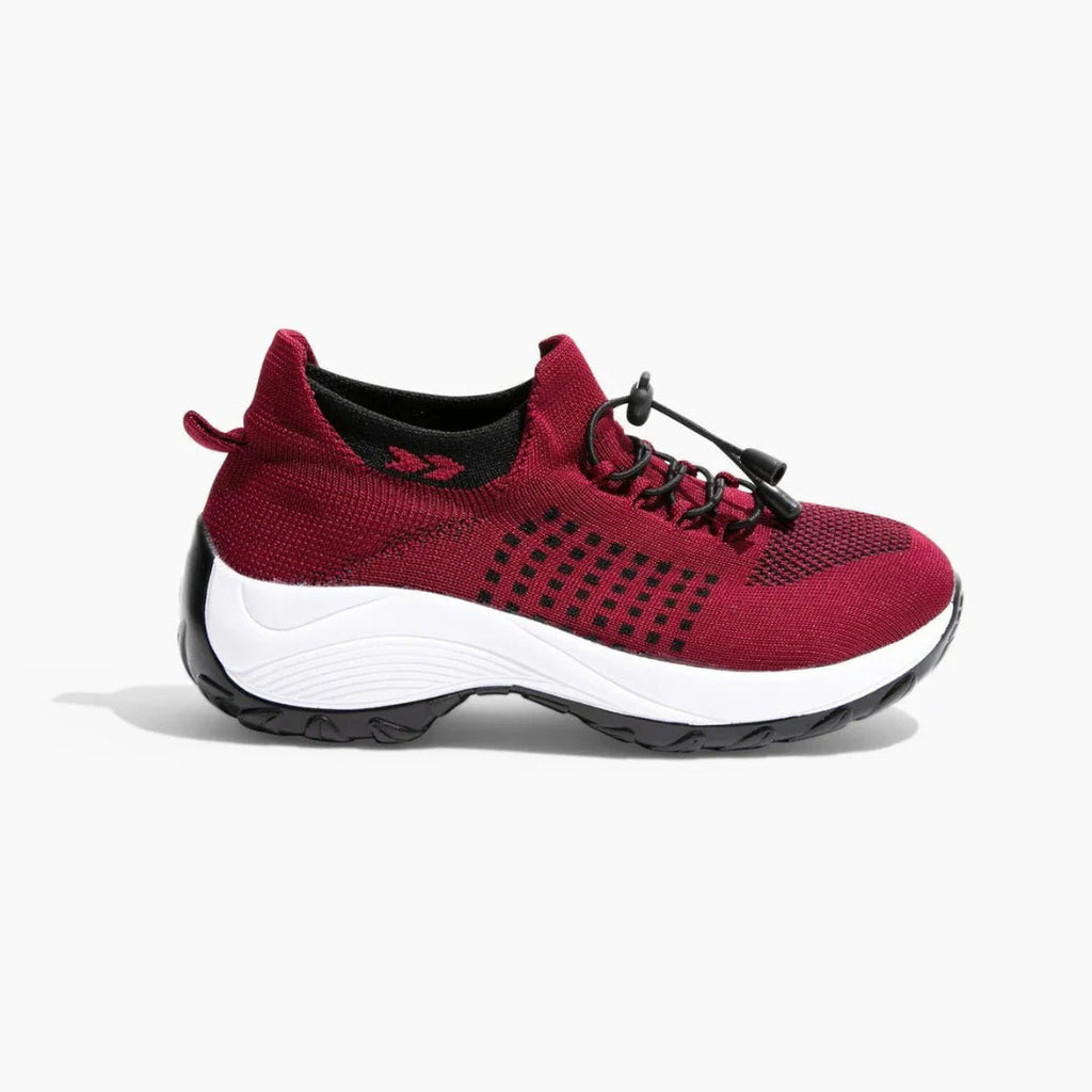 Orthofit trainer flexibility demonstration, showing bendable sole for natural movement