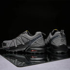 SpeedCross IV trainers on muddy trail demonstrating superior grip performance.