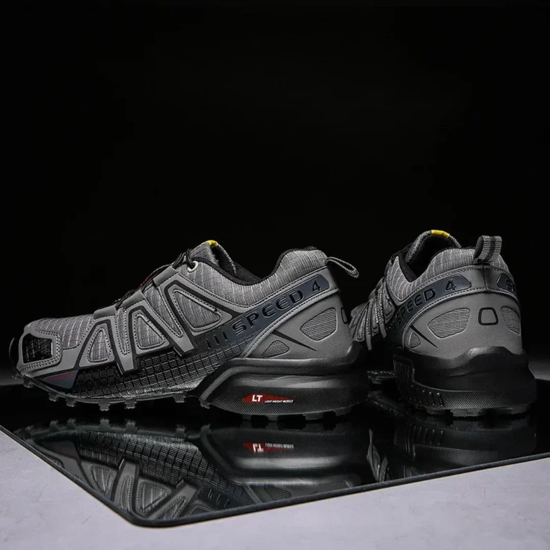 SpeedCross IV trainers on muddy trail demonstrating superior grip performance.