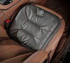 Velario ergonomic car cushion shown fitted on a car seat providing lumbar support.