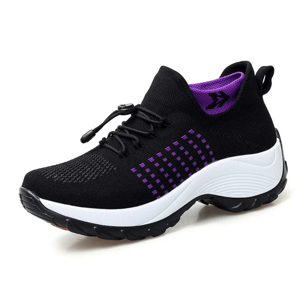Orthofit ergonomic pain-relief trainers for sensitive feet, side view showing breathable fabric and flexible sole