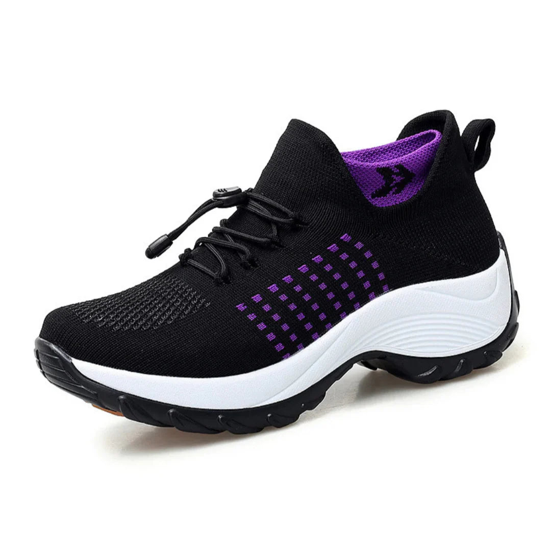 Orthofit ergonomic pain-relief trainers for sensitive feet, side view showing breathable fabric and flexible sole
