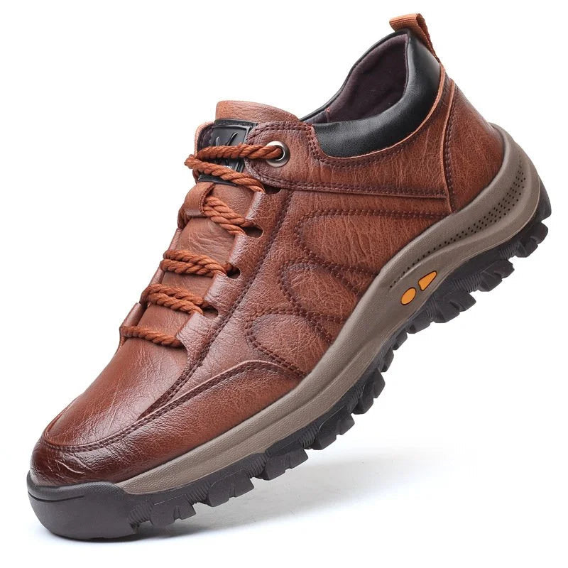 Close-up of men's orthopaedic boot upper showing soft leather texture and breathable design