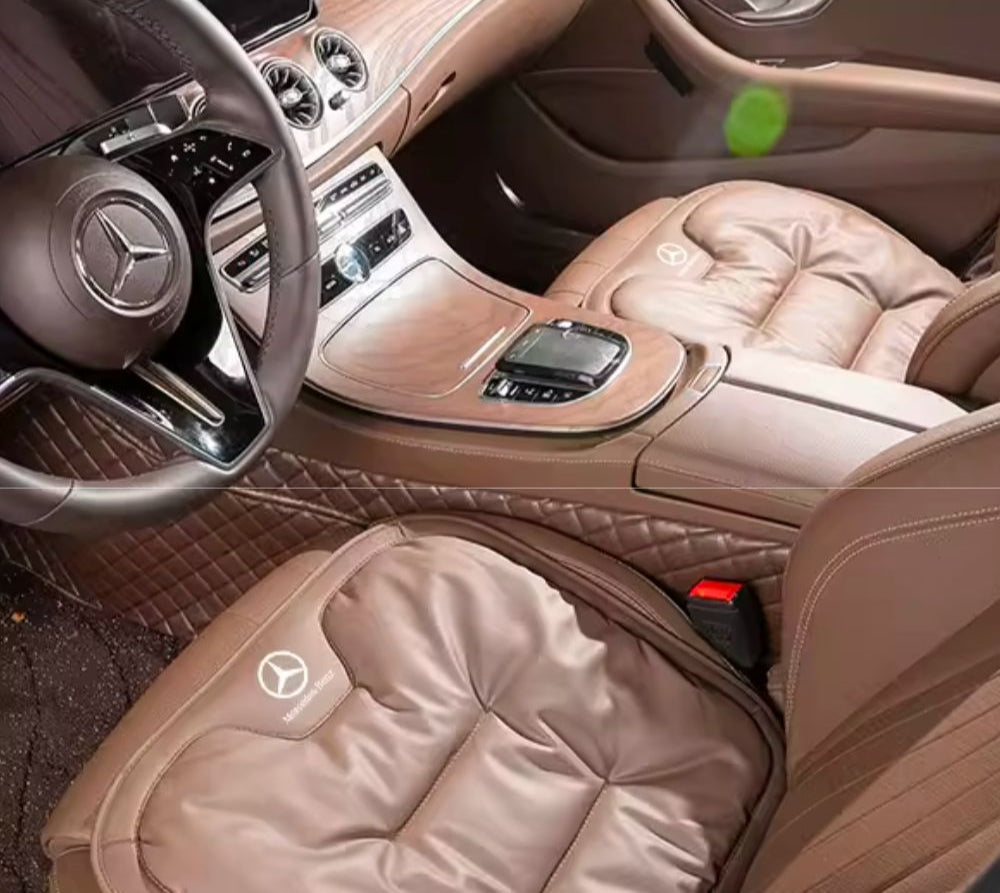 Close-up view of the Velario car cushion showing breathable fabric and ergonomic contours.