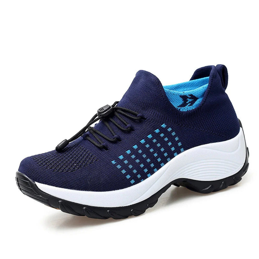 Orthofit trainers worn by person walking comfortably, demonstrating ergonomic support and natural posture