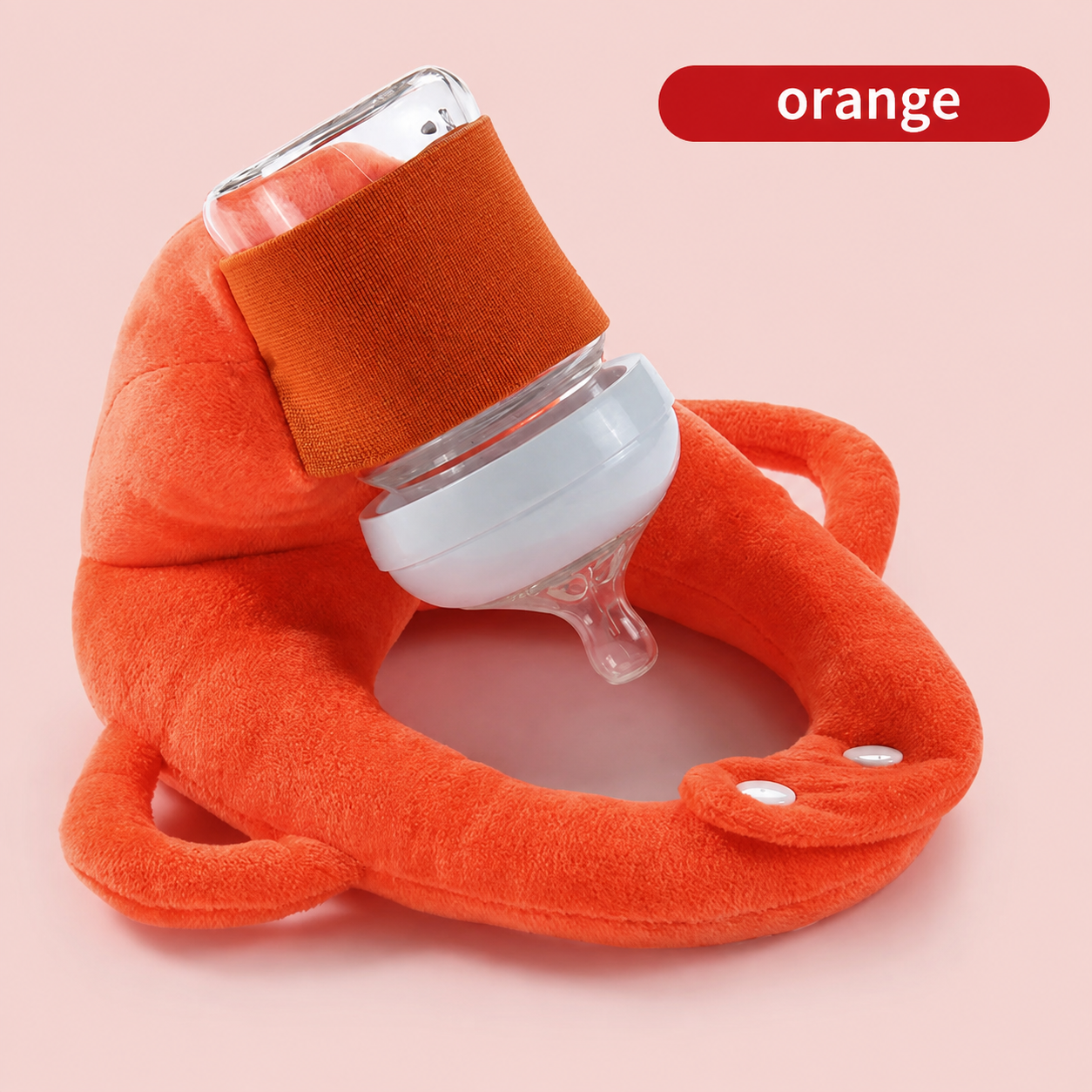 Baby using self-feeding cushion with bottle securely held in place