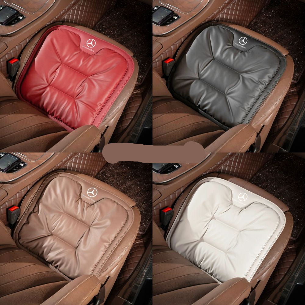 Velario car cushion demonstrating adjustable straps for secure fitting on various car seats.