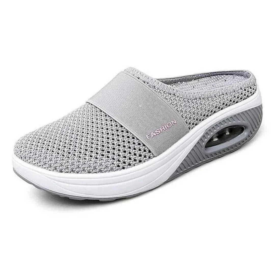 Side view of OrthoAir shoes demonstrating open practical design and modern minimalist style