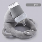 Side view of baby comfortably supported by feeding cushion pillow