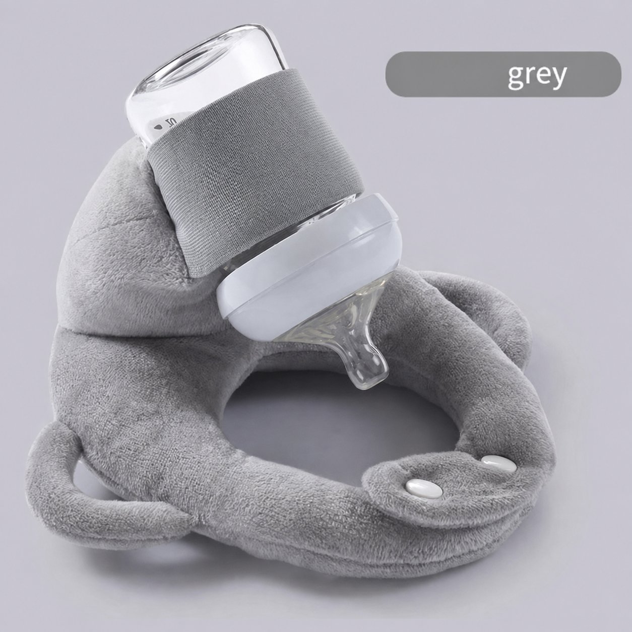 Side view of baby comfortably supported by feeding cushion pillow
