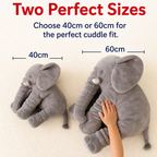 Pink elephant plush pillow displayed as nursery decoration