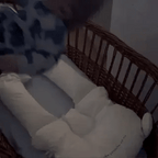 Portable Modish-Vogue Baby Sleep Cushion being carried, demonstrating its lightweight travel-friendly design.
