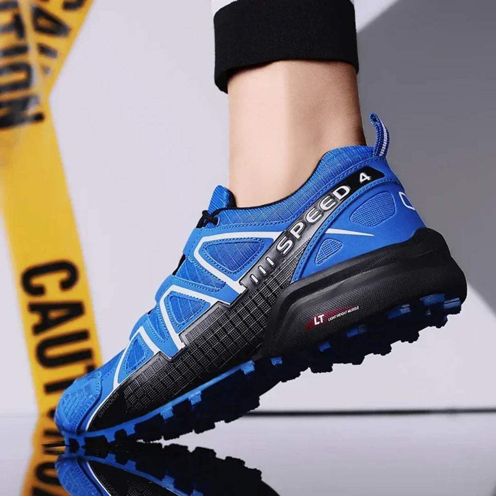 SpeedCross IV trainers on trail terrain showcasing aggressive tread pattern.