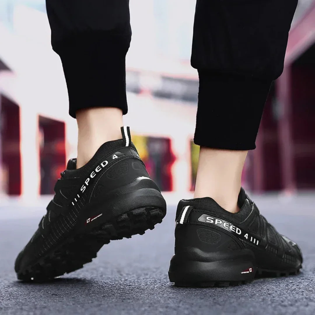 SpeedCross IV trainers in Black-Yellow colourway with modern sporty design.
